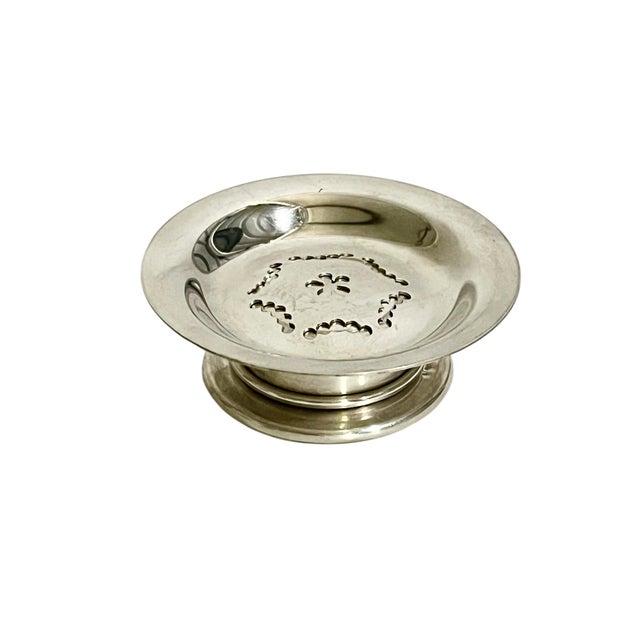 Charming vintage French silver plate coquillor, traditionally used as a butter press/curler or elegant serving piece. This...