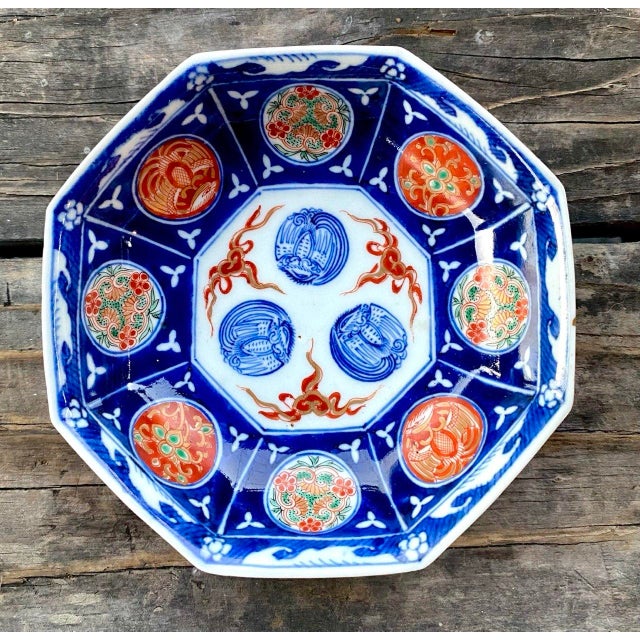 A beautifully hand-painted Japanese Imari porcelain bowl dating to the late Meiji period, featuring a striking octagonal...