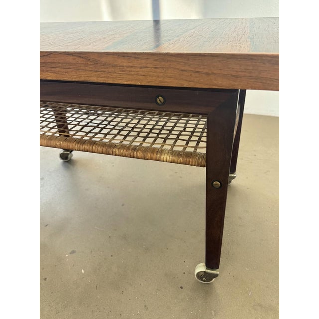 Scandinavian Indonesian Rosewood Coffee Table on Wheels with Magazine Rack, 1960s For Sale - Image 9 of 10