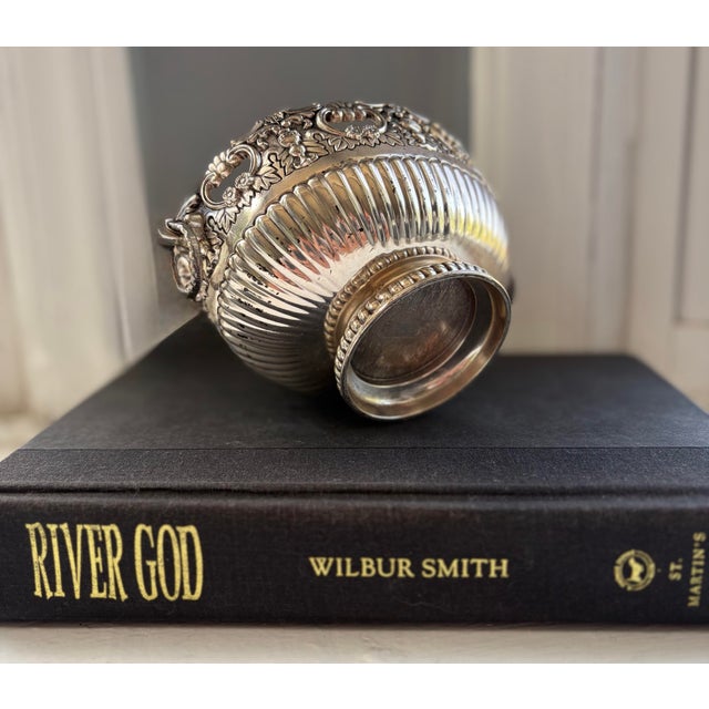 This beautiful silver-plated Monteith pedestal bowl by F.B. Rogers Silver Co., modeled after traditional 17th-century...
