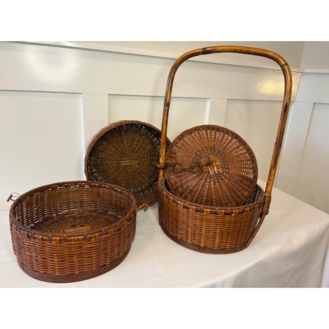 This beautiful large woven 3 compartment rattan and bamboo Chinese wedding basket. The lid is connected with a chain, and...