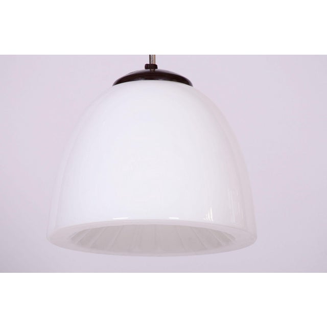 This original pendant chandelier, originating from the 1960s, represents a magnificent example of Czechoslovak design...
