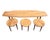 A Mid Century Modern coffee table produced by Conant Ball. Made of maple wood, this elongated table has three stools or...