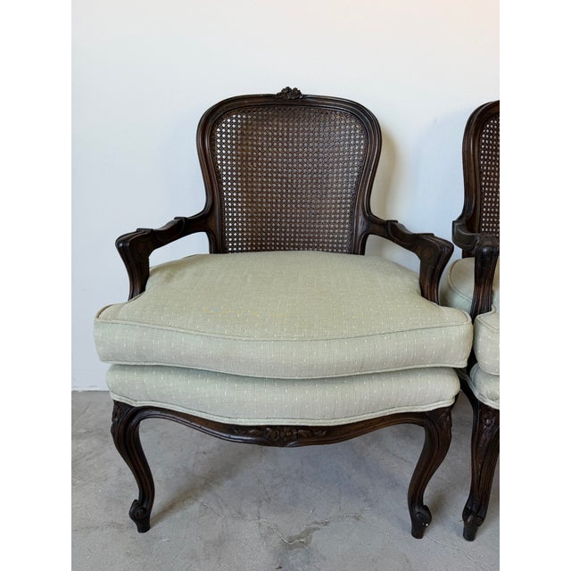 Vintage French Louis XV Style Carved Walnut & Cane Back Arm Accent Chairs – A Pair For Sale - Image 4 of 12