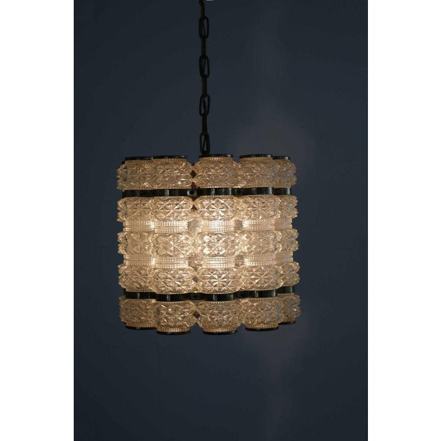 Discover Orrefors for Tyringe Sweden chandelier chandelier lamp brass 1960s. Height with chain 104cm. Up to 250V...
