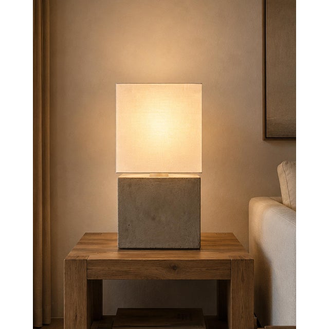 Modern square cube design table lamp with lightweight concrete resin base and white linen shade. Each is slightly unique...