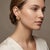 Elevate your elegance with our stunning Ribbon Wave Swirl Design Earrings, crafted from luxurious stamped 18k Yellow Gold....