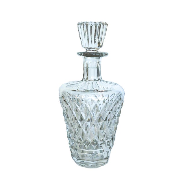 A rare mid-century Waterford Crystal “Boyne” decanter and pitcher set, hand-cut in Ireland with the deep diamond...