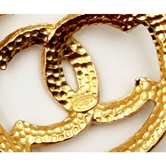 Metal Chanel Vintage Gold Plated CC Ribbon Tear Drop Ribbon Large 2 in 1 Clip on Earrings, A Pair For Sale - Image 7 of 7