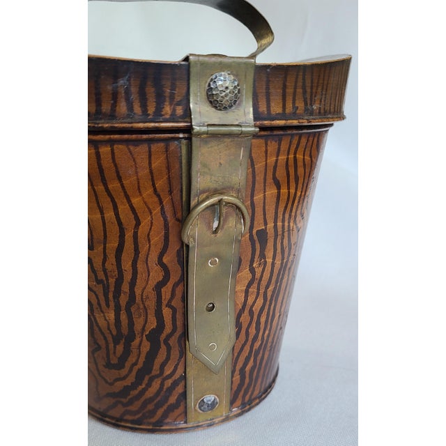 Antique wooden biscuit box with brass hardware fashioned after an English hat box