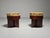 A pair of Art-deco style walnut veneer and floral-printed fabric (vanity) stools designed and produced in Italy, c. 1930s....