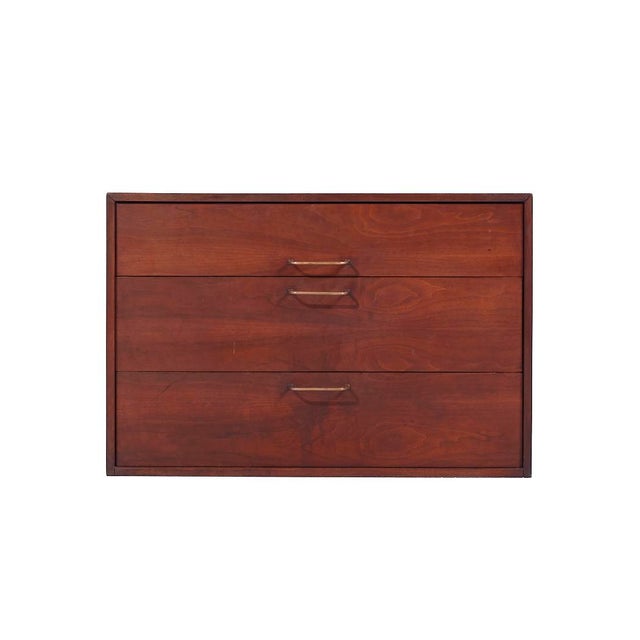 Jens Risom Mid Century Walnut and Brass Wall Mounted Cabinet Chest of Drawers This chest of drawers measures: 36 wide x 21...