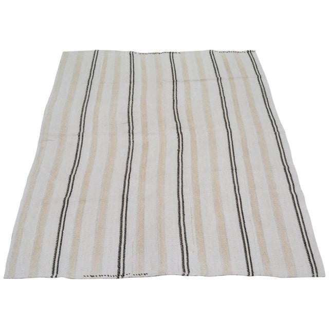 Flatweaved with care using traditional rug-making techniques, this hemp rug blends timeless craftsmanship with a modern...