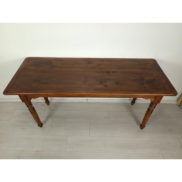 Old bistro table in solid walnut. Height under headband 62cm