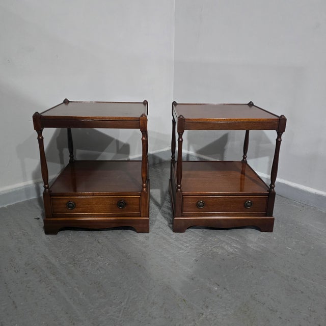 A good pair of Regency style mahogany two tier lamp tables, each with a single drawer, in overall very good condition. 21"...