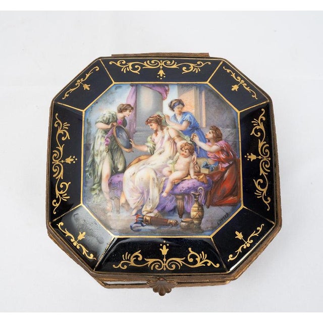 Description: An antique Napoleon III jewelry box made of polychrome Sèvres porcelain, signed "Eonard," dating from the...