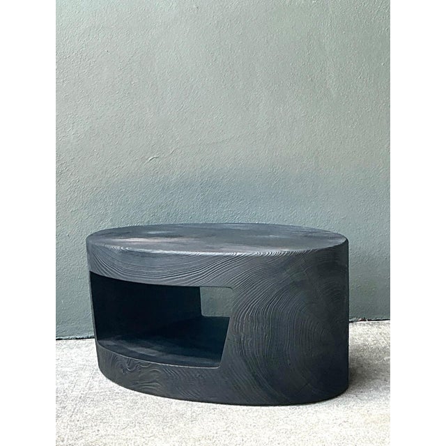 This vintage coffee table, reflecting the masterful aesthetic of Christian Liaigre, is a study in refined simplicity and...