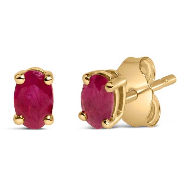 Immerse yourself in the splendor of these resplendent stud earrings, each adorned with a natural, oval-cut red ruby,...