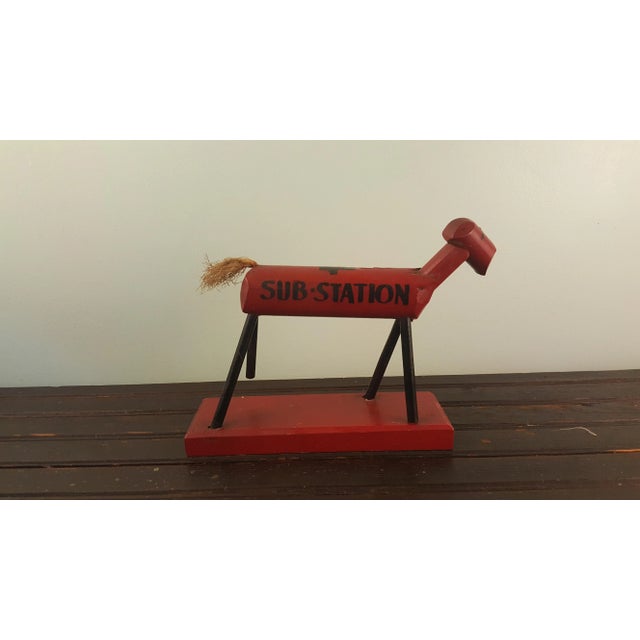 This is a wonderful piece of American Folk Art. This great little horse is painted red and leans forward with one leg off...