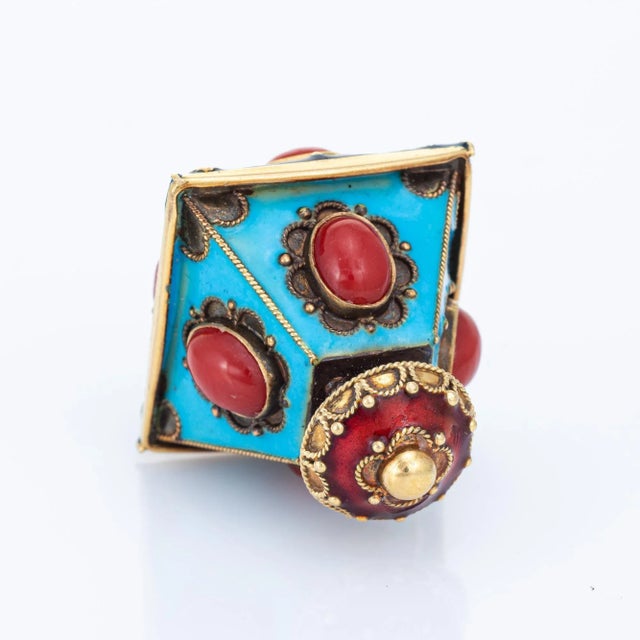 Finely detailed vintage lantern charm crafted in 18 karat yellow gold (circa 1960s). Eight pieces of cabochon cut...