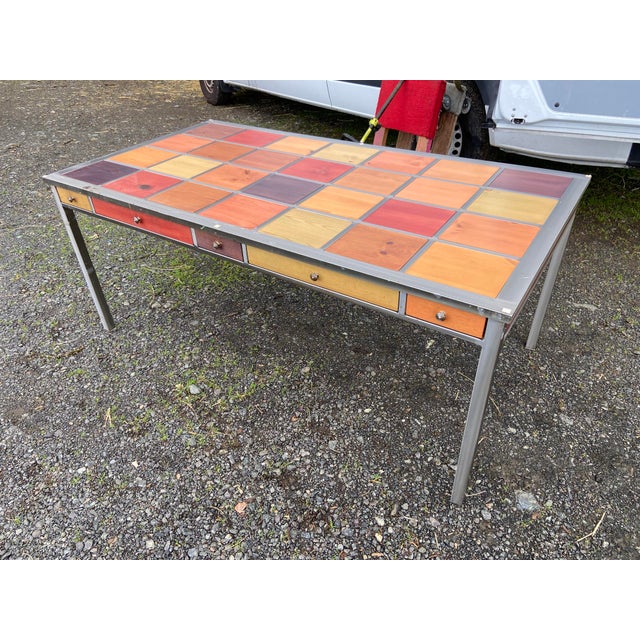 The Venezia Furniture Modern Brushed Steel Table is a sleek and stylish dining table that features a rectangular shape...