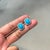 These vintage-inspired halo stud earrings feature 3.88 carats of turquoise, set in 14k white gold. Each turquoise...
