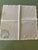 Set of 8 off-white linen napkins with delicate corner embroidery. Crafted for a refined table setting and everyday use.