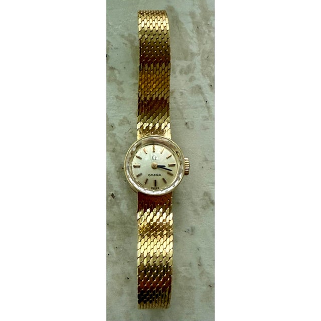 Omega Rare Vintage 14 Karat Gold Ladies Omega Dress Wristwatch, Circa 1968 With Manual Wind-Up & Woven Gold Mesh Band by Premier Swiss Maker Omega For Sale - Image 4 of 12