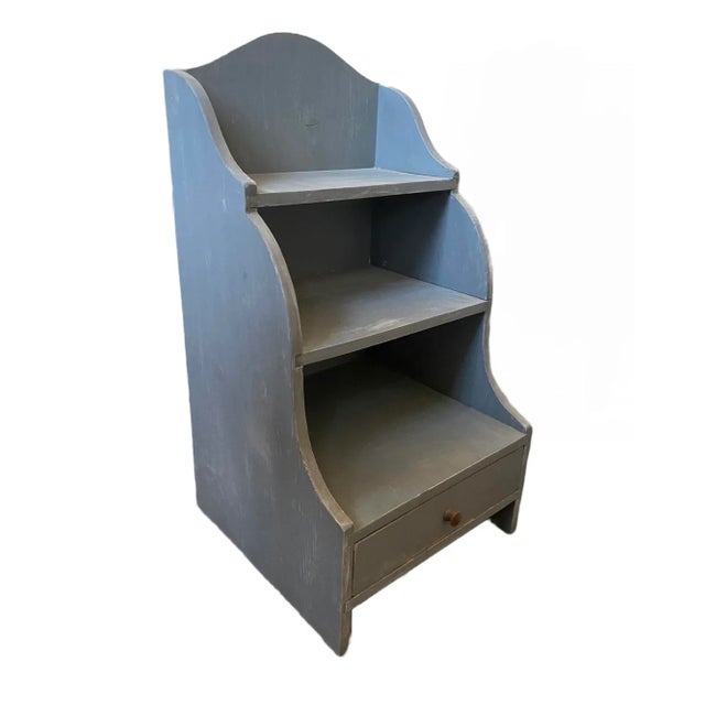 Small blue nightstand end table, has a nice scalloped shape.