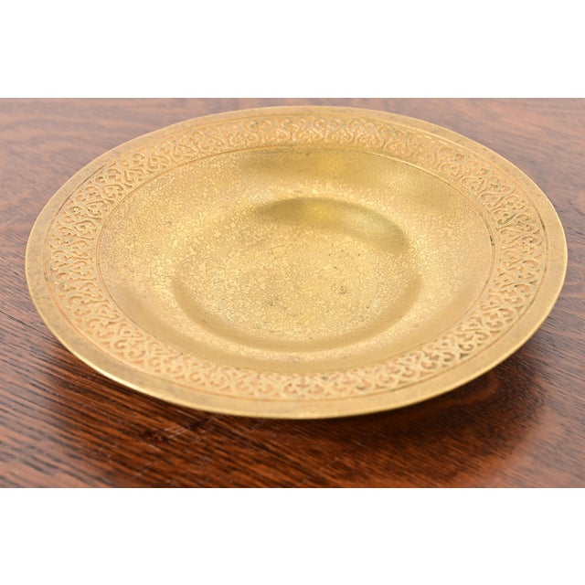 A gorgeous Arts & Crafts or Art Deco period gilt bronze bowl with decorative border By Tiffany Studios (signed to the...