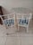Metal Dining Patio Set Square Table Glass Top White Chairs on Wheels Set of 3 Style: Traditional Color: White Dimensions:...