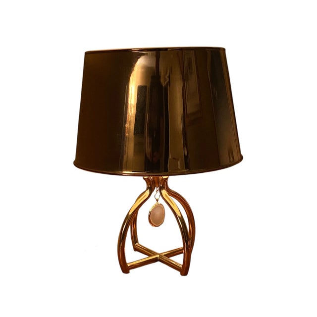 Against the pallor of a winter scene or neutral textiles and flooring, the pop of rose gold light fixtures can add a...