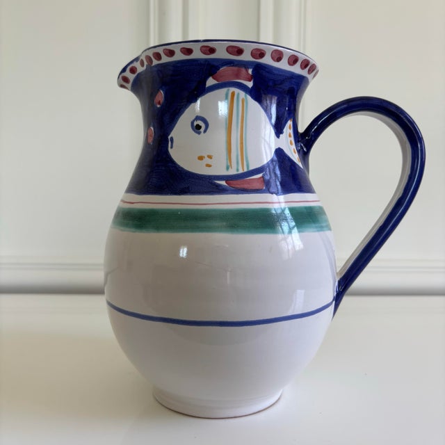 - Vibrant hand painted design featuring fish motif - Crafted in Italy - Size 8"W x 6"D x 8.5"H - Excellent condition, no...