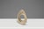 Introducing an alluring textured sculpture of two intertwined loops that showcase a fluid, interlocking design that...