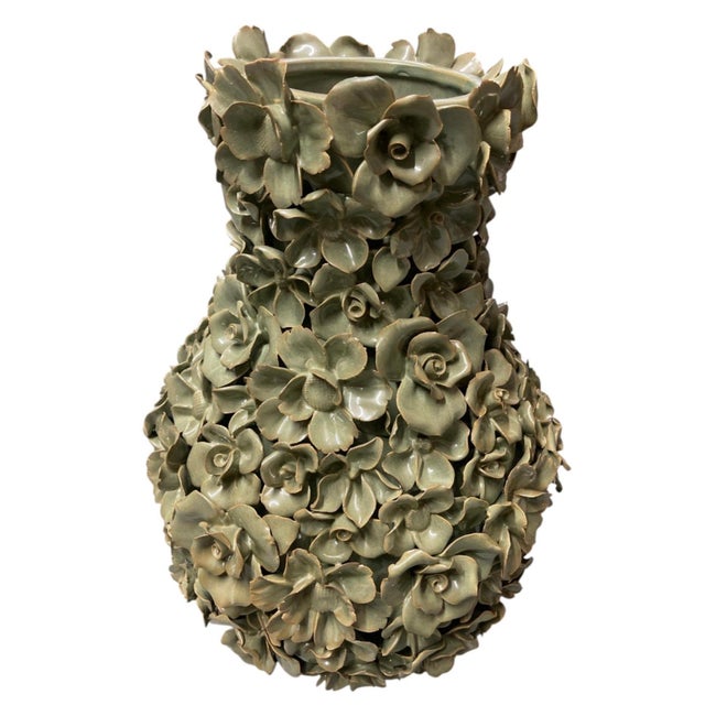 This striking vintage Italian ceramic vase features an ornate, hand-applied floral encrusted design finished in a glossy...