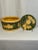 Welcome to Turtle and Crane! Let us introduce to you a Vintage Mid-Century Majolica Green and Yellow Biscuit Container...