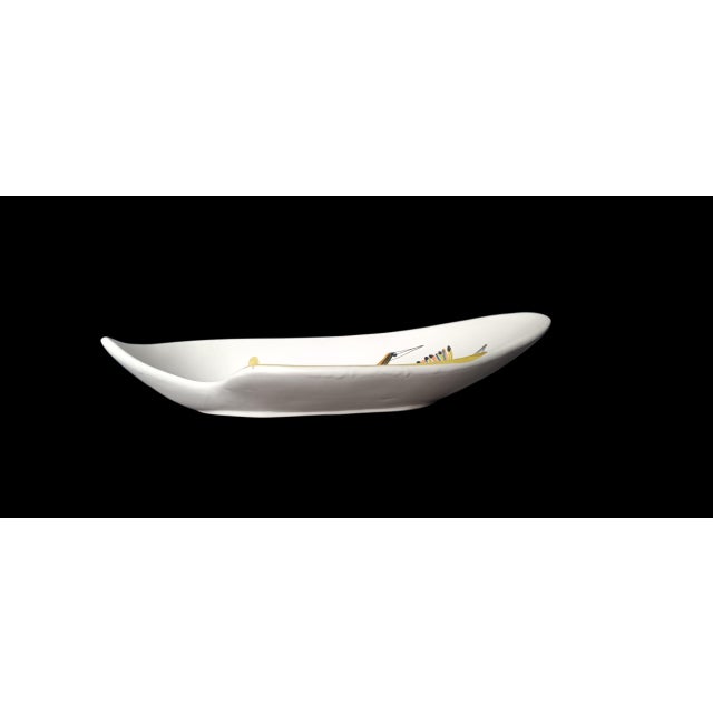 Roger Capron (1922-2006) in Vallauris, large free-form bowl with stylized polychrome decoration of a bird and a flower, in...