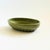 A vintage oval pottery bowl by Haeger finished in a lovely speckled green glaze. Unique detailing to the base. Perfect for...