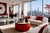 A monumental 48" ceremonial drum, crafted with a substantial wood body finished in red lacquer, fitted with a natural...