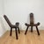 Pair of Brutalist tripod low chairs in solid wood, mid-20th century. Carved backrest Dimensions: Length: 49 cm Depth: 30...