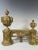This pair French fire andirons are 19th century, Louis XVI style. The heads of andirons are each decorated with an urn on...