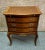 Vintage Three Drawer Chest has a French Style. The Chest is made of Wood. Walnut. Parquet Top, Inlaid Wood, and Brass...