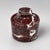 Crafted from natural rosso levanto marble with striking burgundy tones and dramatic white veining, this handcrafted Salt...