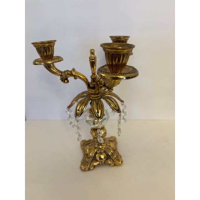 French Rococo revival style inspired design of Italian made candelabras at 10” high by 8” wide and deep. Made in the...