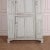 Unusually small 4 door English painted pine housekeepers cupboard. 1810. This piece is designed in the style of the...