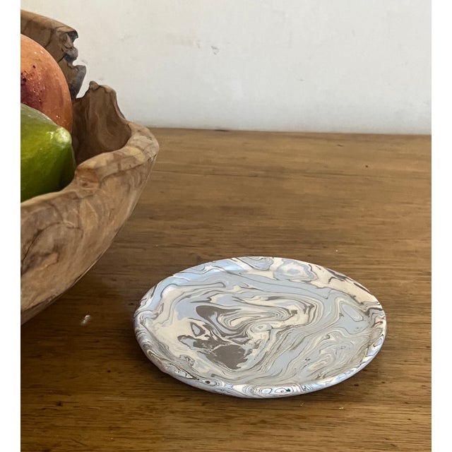 Swirl pattern pottery catchall / coasters made by hand in Southwest France by small artisanal potter Les Terres du Hibou.