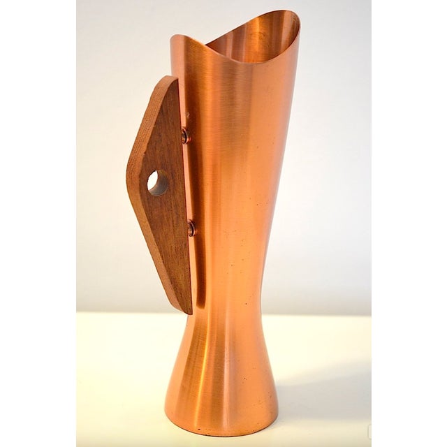Vintage copper vase from the 1960s with a kidney-shaped teak handle