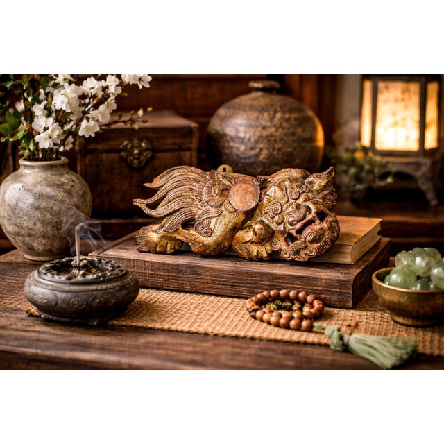 Discover the powerful presence of this circa 1900 hand-carved Asian guardian lion (shishi / foo dog), a striking and...