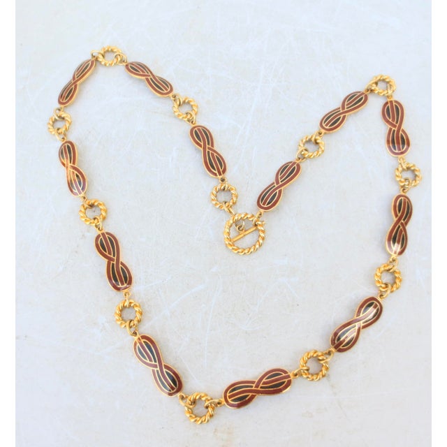 Vintage Gucci Enamel and Gold plate metal Belt circa 70s. Enamel with double G logo and marked Gucci to the toggle. Made...