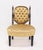 This elegant, low-profile slipper or bedroom accent chair features an exquisite deeply button-tufted upholstery in a...